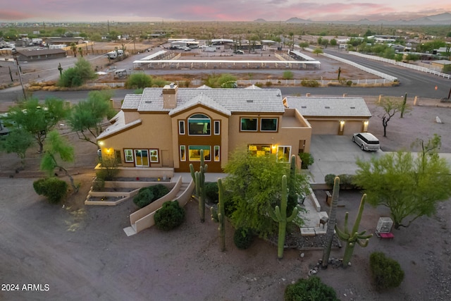 view of aerial view at dusk