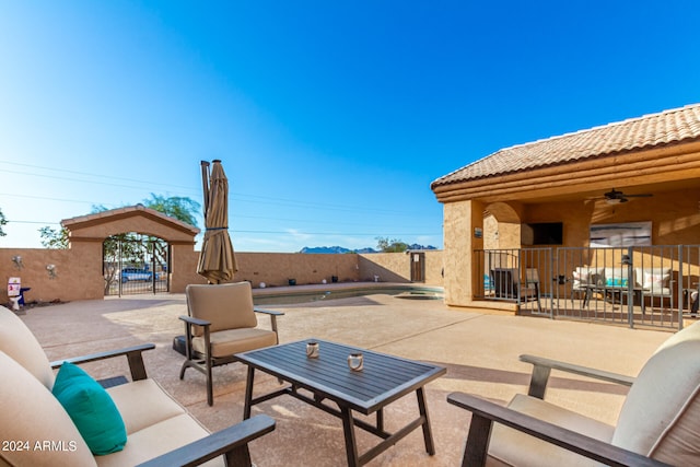 view of patio / terrace with outdoor lounge area and ceiling fan