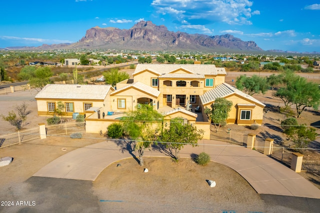 view of front of home featuring a mountain view