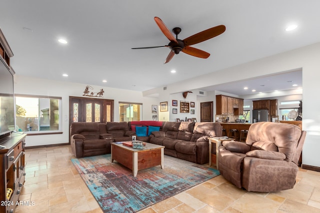 living room with ceiling fan