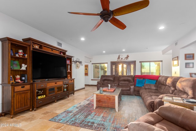 living room with ceiling fan