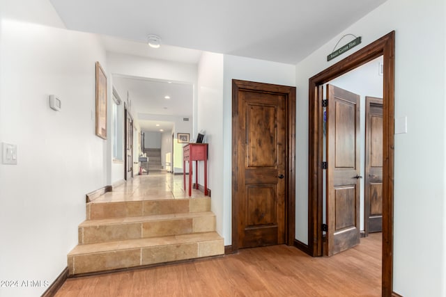 hallway with light wood-type flooring