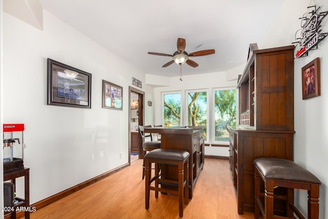 misc room featuring ceiling fan and light hardwood / wood-style floors