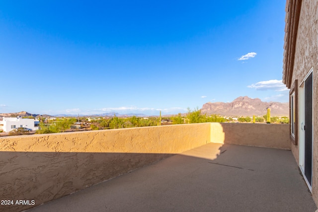 view of patio / terrace with a mountain view