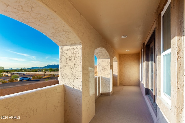 balcony featuring a mountain view