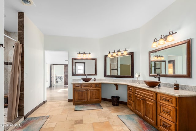 bathroom featuring vanity and a shower with curtain