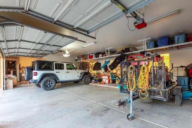 garage featuring a garage door opener