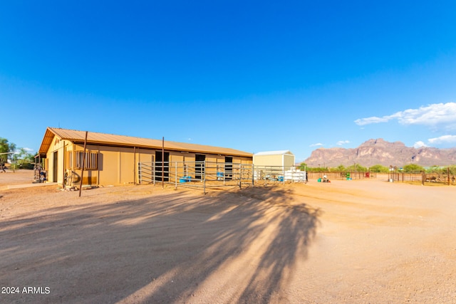 exterior space featuring an outdoor structure and a mountain view