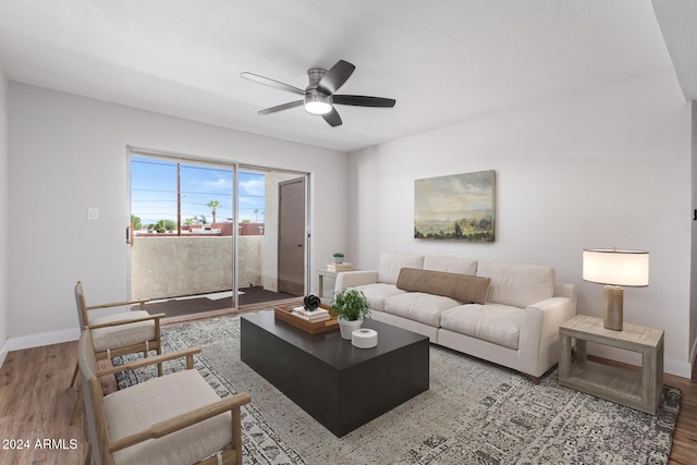 living room with ceiling fan and hardwood / wood-style floors