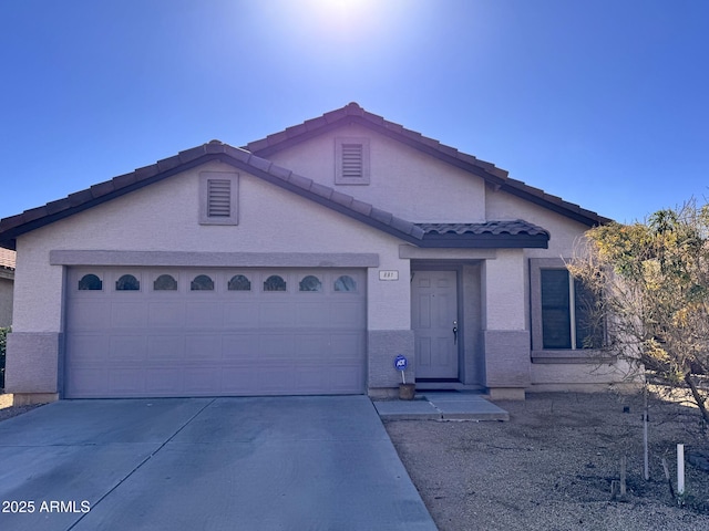 view of front of property featuring a garage