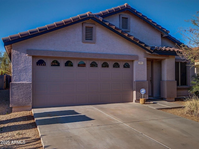 view of front of home featuring a garage