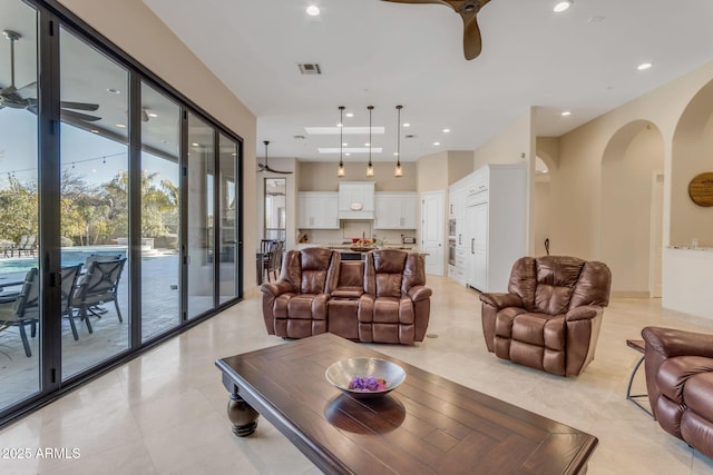 living room featuring ceiling fan