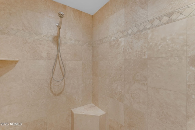 details featuring tiled shower