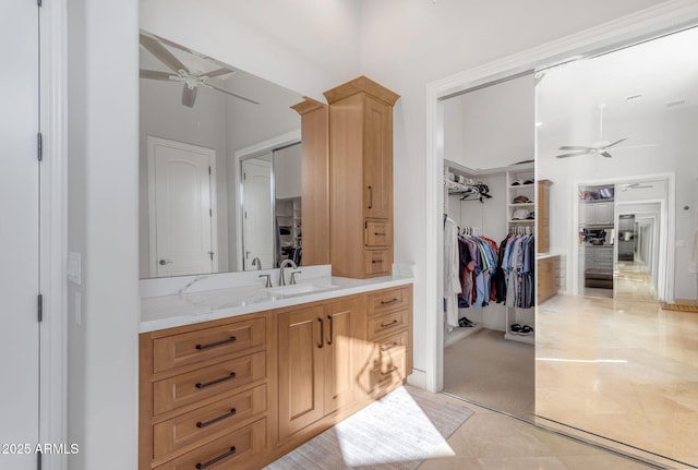 bathroom with vanity and ceiling fan