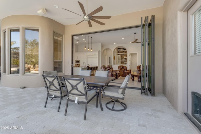 view of patio / terrace with ceiling fan