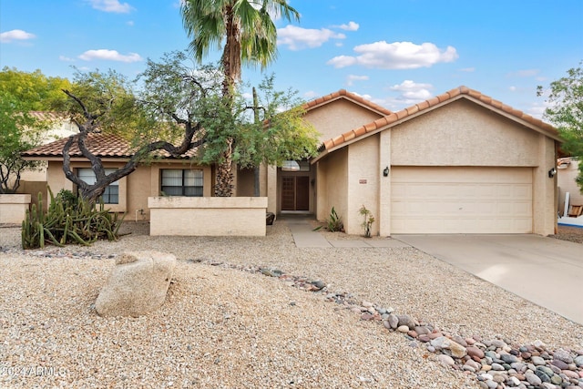 view of front of property featuring a garage