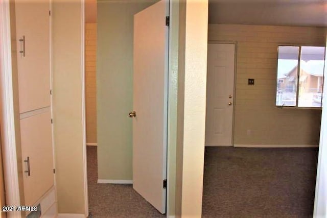 11201 W Missouri Ave, Youngtown, AZ 85363 - hall with baseboards and carpet
