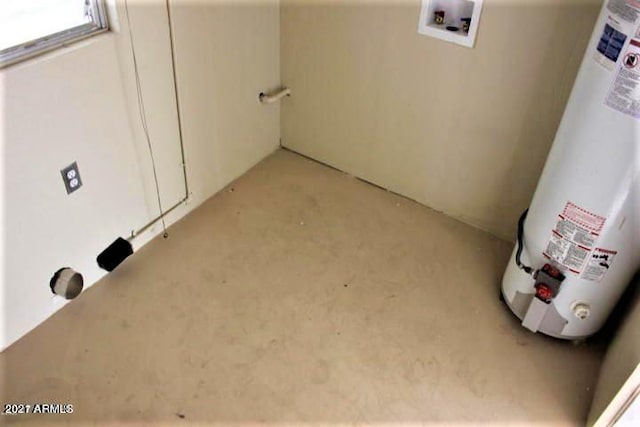 11201 W Missouri Ave, Youngtown, AZ 85363 - laundry room with laundry area, light carpet, water heater, and hookup for a washing machine