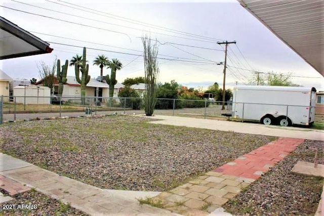 11201 W Missouri Ave, Youngtown, AZ 85363 - view of yard with fence