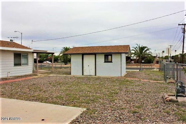 11201 W Missouri Ave, Youngtown, AZ 85363 - view of shed featuring fence