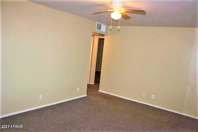 11201 W Missouri Ave, Youngtown, AZ 85363 - empty room with visible vents, baseboards, ceiling fan, and dark carpet