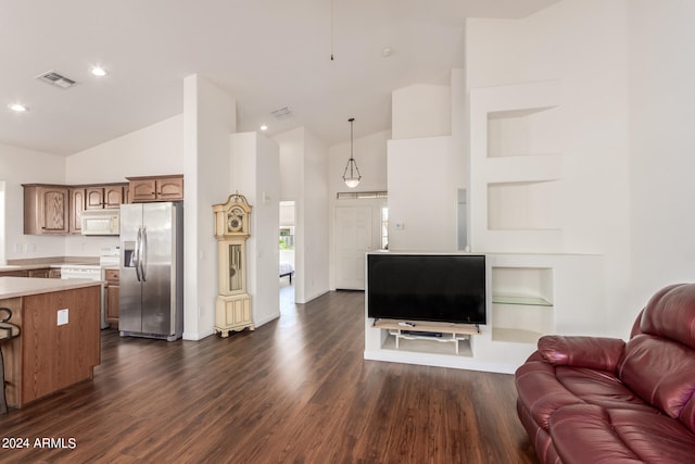 living room featuring high vaulted ceiling and dark hardwood / wood-style flooring