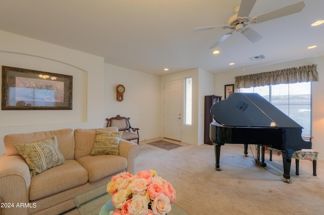 carpeted living room with recessed lighting, visible vents, and ceiling fan