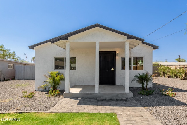 view of front of house with a patio