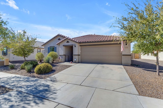 view of front of property featuring a garage