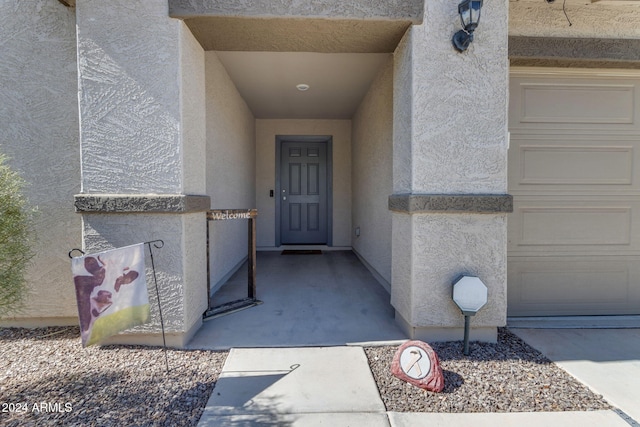 property entrance featuring a garage