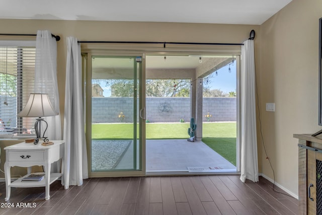 doorway featuring hardwood / wood-style floors