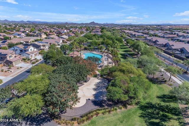 birds eye view of property with a mountain view