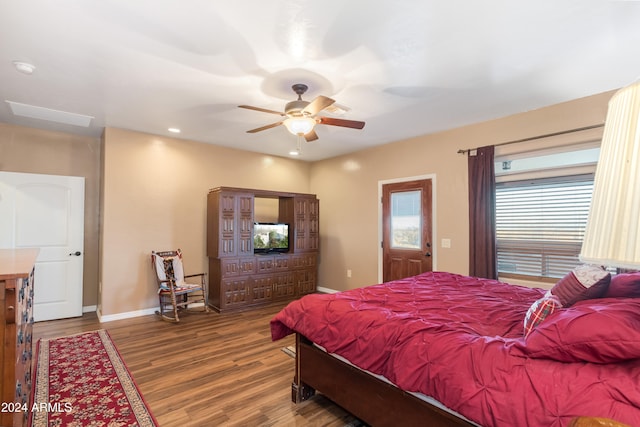 bedroom with hardwood / wood-style flooring and ceiling fan