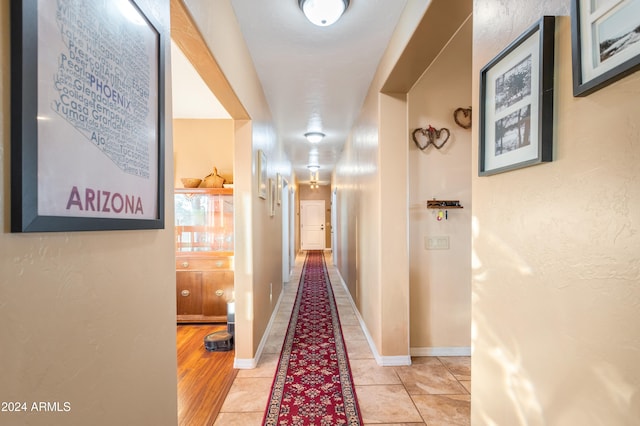 hallway with wood-type flooring