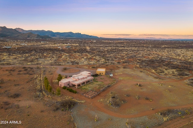 aerial view at dusk with a mountain view