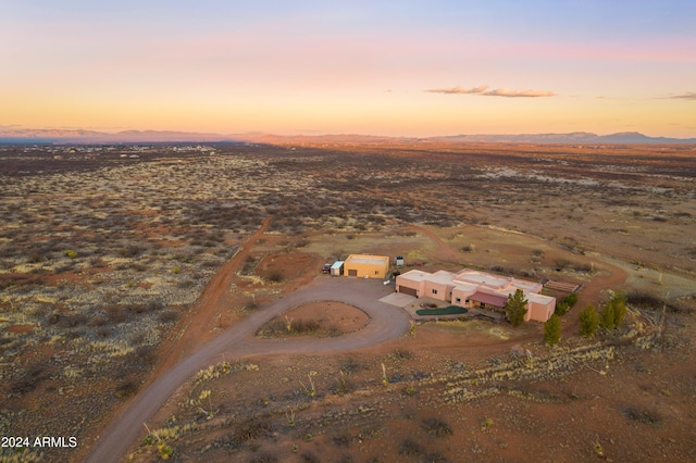 aerial view at dusk with a mountain view