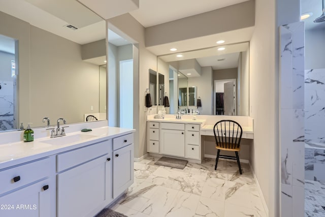 25979 W Taro Dr, Buckeye, AZ 85396 - bathroom featuring marble finish flooring, two vanities, and recessed lighting