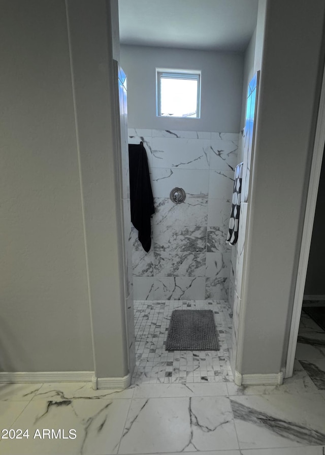 25979 W Taro Dr, Buckeye, AZ 85396 - full bath featuring marble look tiles and a marble finish shower