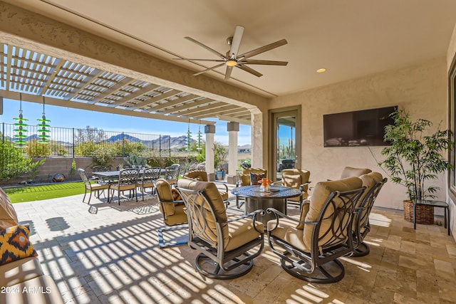 25979 W Taro Dr, Buckeye, AZ 85396 - view of patio / terrace with outdoor dining space, a pergola, and a ceiling fan