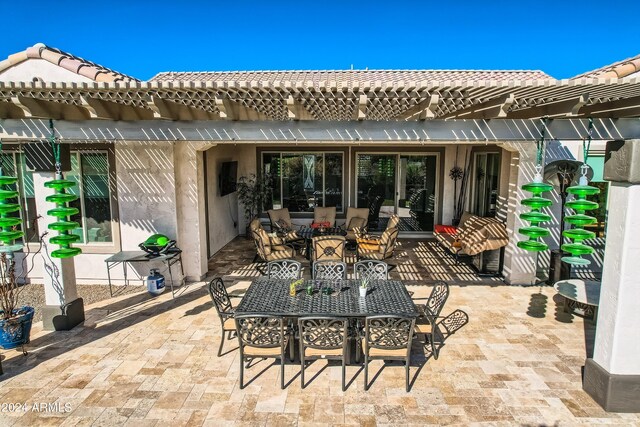 25979 W Taro Dr, Buckeye, AZ 85396 - view of patio featuring outdoor dining area and a pergola