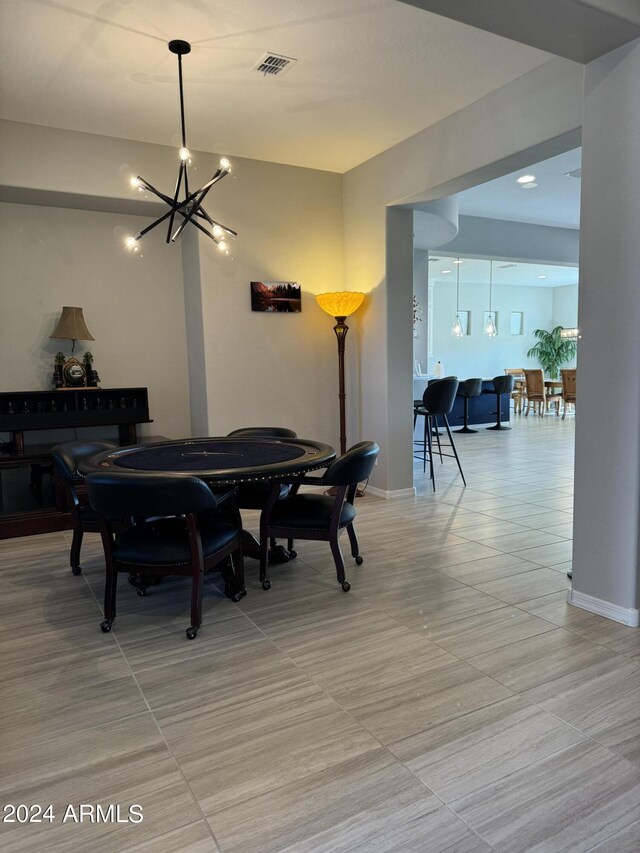 25979 W Taro Dr, Buckeye, AZ 85396 - dining area featuring a chandelier and baseboards