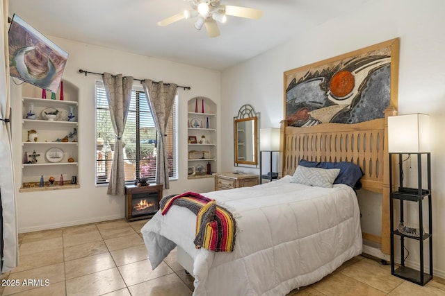 8167 E Sand Flower Dr, Scottsdale, AZ 85266 - tiled bedroom with ceiling fan and baseboards