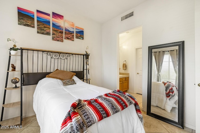 8167 E Sand Flower Dr, Scottsdale, AZ 85266 - bedroom with light tile patterned flooring and ensuite bath