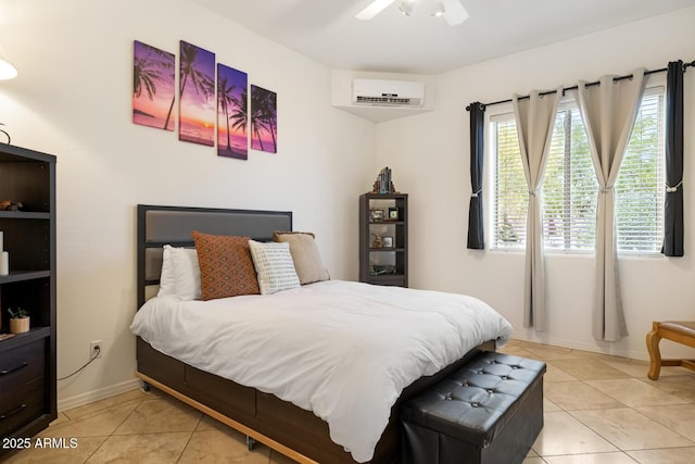8167 E Sand Flower Dr, Scottsdale, AZ 85266 - bedroom featuring a wall unit AC, light tile patterned flooring, baseboards, and a ceiling fan