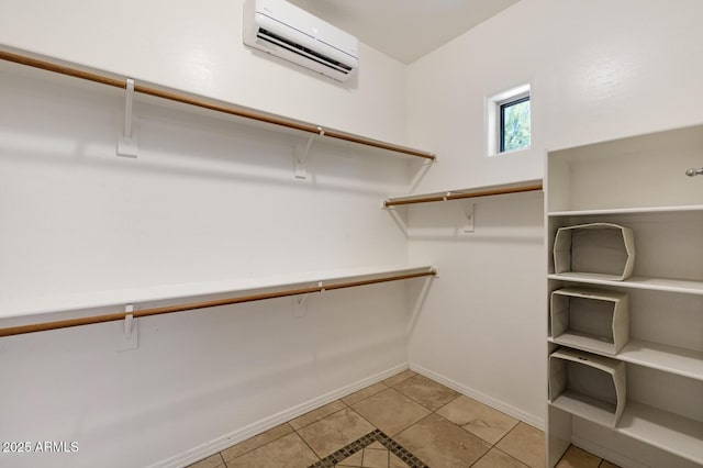 8167 E Sand Flower Dr, Scottsdale, AZ 85266 - spacious closet featuring a wall mounted air conditioner and light tile patterned floors