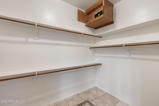 8167 E Sand Flower Dr, Scottsdale, AZ 85266 - spacious closet with light tile patterned floors