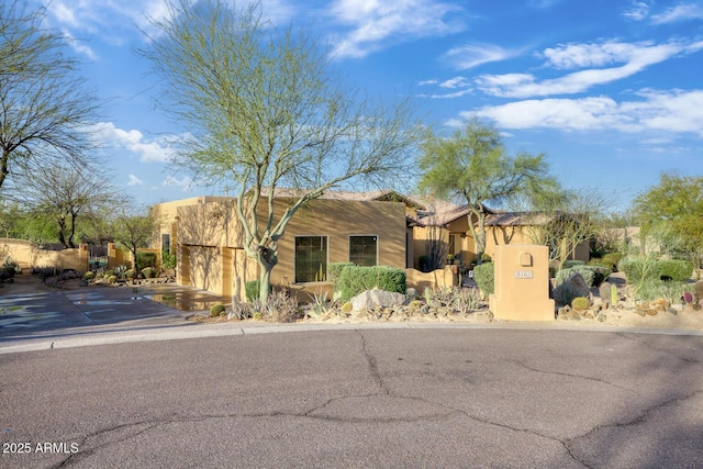 8167 E Sand Flower Dr, Scottsdale, AZ 85266 - pueblo-style home with stucco siding