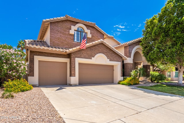 view of front of property featuring a garage