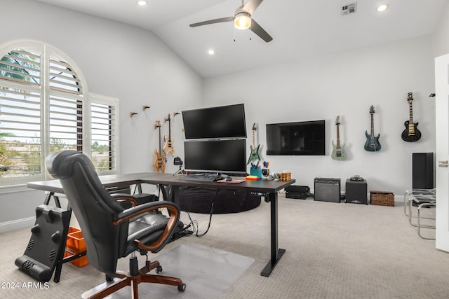 home office with light carpet, ceiling fan, and lofted ceiling