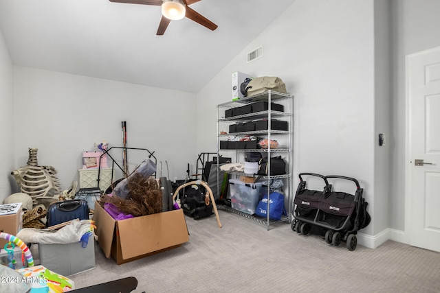 recreation room featuring vaulted ceiling, carpet, and ceiling fan